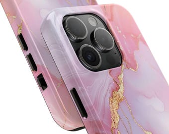 May include: A close-up of two phone cases. The cases have a pink and white marble design with gold accents. The phone case on top has a camera lens cutout.