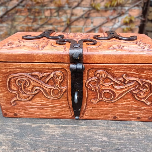 Wooden chest with hand forged hinges. Solid wooden box for treasures.  Featuring hand forged ironwork and handmade carvings Viking patterns