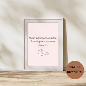 May include: A printable digital download of a pink background with a black and white quote from Proverbs 31:25, "Strength and honor are her clothing: She shall rejoice in time to come." The quote is centered on the page with a small heart and cross design below it.