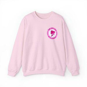 Pink looks good on Everything Unisex Heavy Blend™ Crewneck Sweatshirt