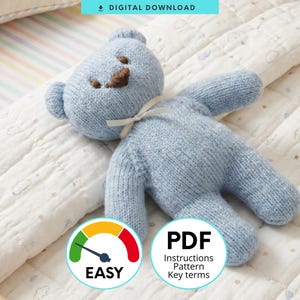 May include: A light blue knitted teddy bear with a brown stitched nose and a cream-colored ribbon tied around its neck. The bear features a simple, soft texture and is presented as a digital download pattern with easy instructions included.