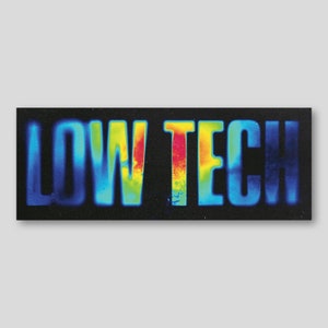 May include: A thermal image of the words "LOW TECH" in a rainbow of colors on a black background.
