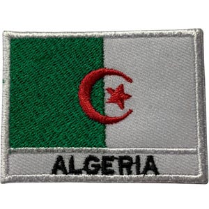 May include: Embroidered patch featuring the flag of Algeria. The design includes a green and white vertical stripe background, with a red crescent and star emblem. The word "ALGERIA" is embroidered in white at the bottom.