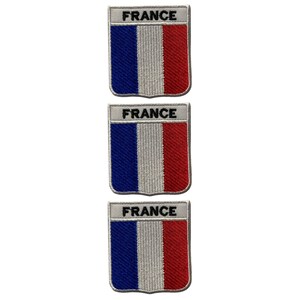 May include: Three embroidered patches displaying the French flag. Each patch has a rectangular top with the word "FRANCE" in black. The flag design features vertical stripes in blue, white, and red.