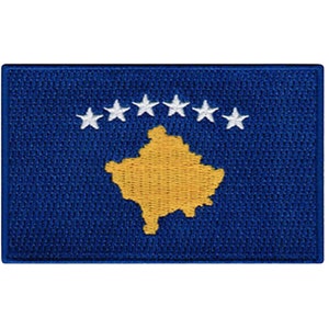 May include: A blue embroidered patch with the flag of Kosovo. The flag features a gold outline of the country's shape and six white stars in a semicircle.