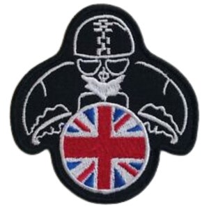 May include: Black and white embroidered patch of a person wearing a helmet and sunglasses, holding a red, white, and blue Union Jack flag.