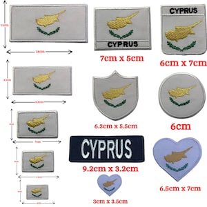 May include: A set of 10 iron-on patches featuring the flag of Cyprus. The patches are in various shapes and sizes, including rectangular, shield, circle, and heart. The patches are white with a gold map of Cyprus and green olive branches.