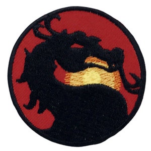 May include: An embroidered patch featuring a black dragon silhouette against a red background, with yellow detailing.