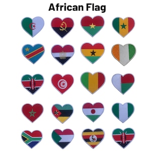 May include: A collection of 16 heart-shaped patches featuring the flags of African countries. The patches are embroidered with the colours and symbols of each flag.