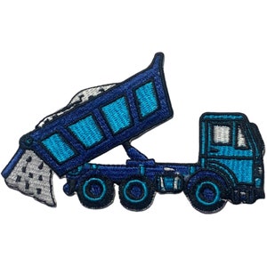 May include: A blue dumper truck with a white and grey load of gravel in the bed. The truck has a blue cab and black tyres.