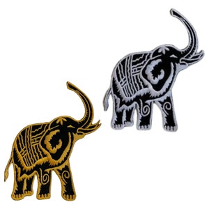 May include: Two embroidered iron-on patches of elephants. One is black with gold stitching and the other is gold with black stitching.