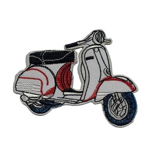 May include: White and red embroidered scooter patch. The scooter has a black seat and blue wheels.