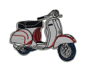 May include: White and red embroidered scooter patch. The scooter has a black seat and blue wheels.
