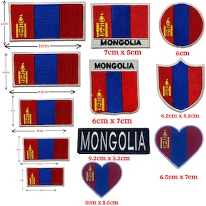 May include: A collection of embroidered patches featuring the flag of Mongolia. The patches vary in shape and size, including rectangular, circular, and heart-shaped designs. The patches display the Mongolian flag's red, blue, and gold colors, with the word "MONGOLIA" on some.