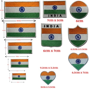 May include: A collection of embroidered patches featuring the Indian flag in various shapes and sizes. The patches include rectangular, circular, and heart-shaped designs, with the flag's orange, white, and green colors and the Ashoka Chakra in the center.