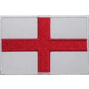 Op de afbeelding: Een witte geborduurde patch met een rood kruis, dat de vlag van Engeland voorstelt.