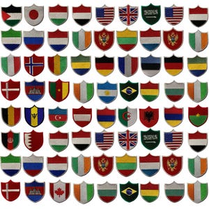 May include: A collection of 64 embroidered iron-on patches featuring various country flags. The patches are shaped like shields and have a white border.