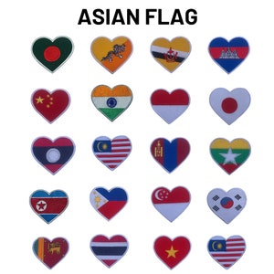 May include: A collection of 20 heart-shaped embroidered patches featuring the flags of Asian countries. The patches are arranged in four rows of five patches each. The flags include Bangladesh, Bhutan, Brunei, Cambodia, China, India, Indonesia, Japan, Laos, Malaysia, Mongolia, Myanmar, North Korea, Philippines, Singapore, South Korea, Sri Lanka, Thailand, Vietnam, and Malaysia.