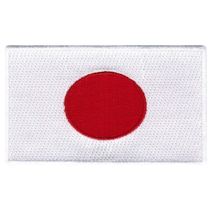Puede incluir: Un parche bordado blanco con un gran círculo rojo en el centro, que representa la bandera de Japón.