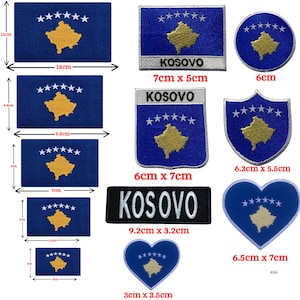 May include: A collection of Kosovo flag patches in various shapes and sizes. The patches feature a blue background with a gold map and six white stars. Sizes range from 1.2 inches x 1.4 inches to 7.1 inches x 4.3 inches. Some patches include the word "KOSOVO".