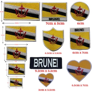 May include: A set of ten embroidered iron-on patches featuring the flag of Brunei. The patches are in various shapes and sizes, including rectangular, heart, and shield shapes. The patches are all white, yellow, and black with a red and gold emblem in the center.