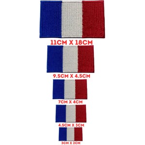 May include: Five different sizes of iron-on patches featuring the French flag. The patches are blue, white, and red. The sizes are 11cm x 18cm, 9.5cm x 4.5cm, 7cm x 4cm, 4.5cm x 3cm, and 3cm x 2cm.