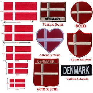 May include: A selection of red and white Danish flag patches in various shapes and sizes. Rectangular, square, heart, shield, and circular designs are shown, with measurements in centimetres.