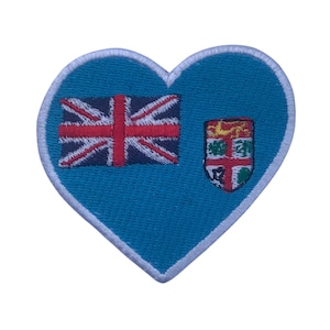 May include: A blue heart-shaped patch with the Union Jack flag and the coat of arms of the British Virgin Islands.