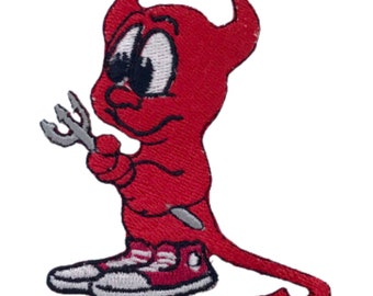 Puede incluir: Diablo rojo de dibujos animados con cuernos, sosteniendo un tenedor y usando zapatillas.