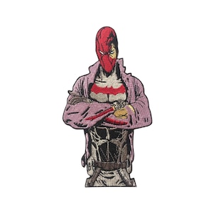 May include: An embroidered patch depicting a superhero with a red mask and a pink jacket. The superhero is standing with their arms crossed and has a determined expression.