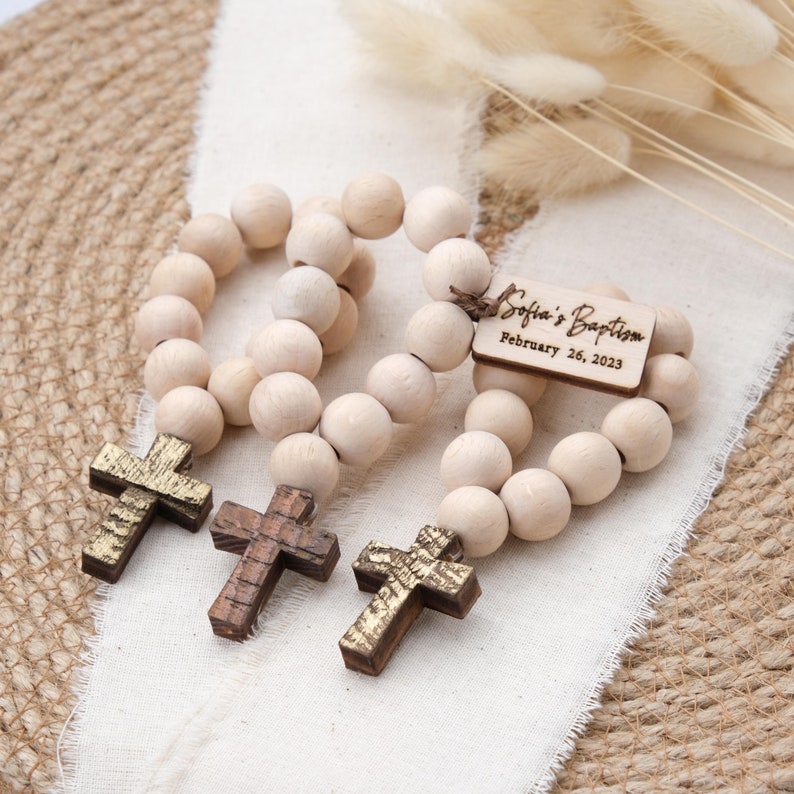 These mini wooden rosary favors are perfect for any religious occasion, such as baptism, christening, communion, or confirmation. They are handmade with love and care, using high-quality wood beads.
