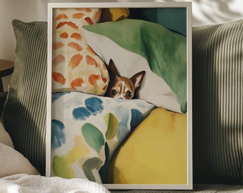 May include: A framed art print featuring a small brown and white dog peeking out from a pile of colorful pillows. The pillows have patterns in orange, blue, yellow, and green. The artwork is displayed on a green striped couch.