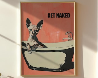May include: A framed wall art print featuring a Sphynx cat sitting in a bathtub against a coral-colored background. The text GET NAKED is printed in black capital letters in the upper right corner of the illustration, which is set in a gold frame.
