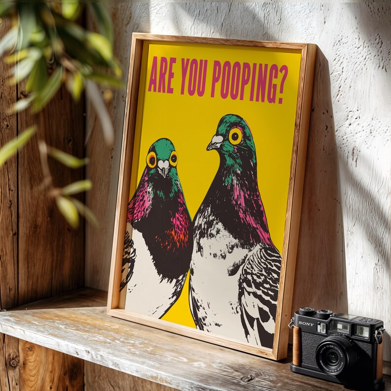 Bright pop art bright yellow poster of two pigeons staring forward,  funny toilet poster or guest bathroom art with text that reads “ARE YOU POOPING?”