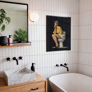 Funny retro style black and yellow toilet wall art with a retro pin-up lady sitting on a toilet, designed as funny bathroom art for restroom wall decor.