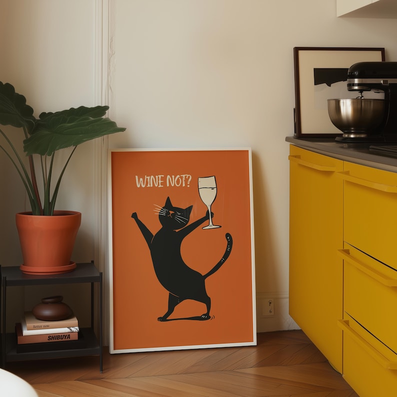 Playful black cat holding a wine glass on an orange background, styled as a funny cat print with minimalist cat art charm, text reads “WINE NOT?”