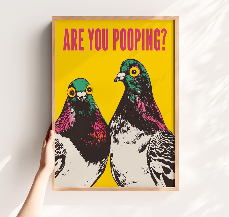 Bright pop art bright yellow poster of two pigeons staring forward,  funny toilet poster or guest bathroom art with text that reads “ARE YOU POOPING?”