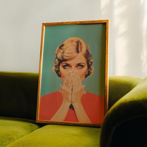 digital illustration of a retro 1950s style woman with blonde hair and blue eyes, wearing a vibrant red top against a teal background. She is holding her hands over her nose with a humorous, shocked expression, perfect for funny bathroom wall decor.