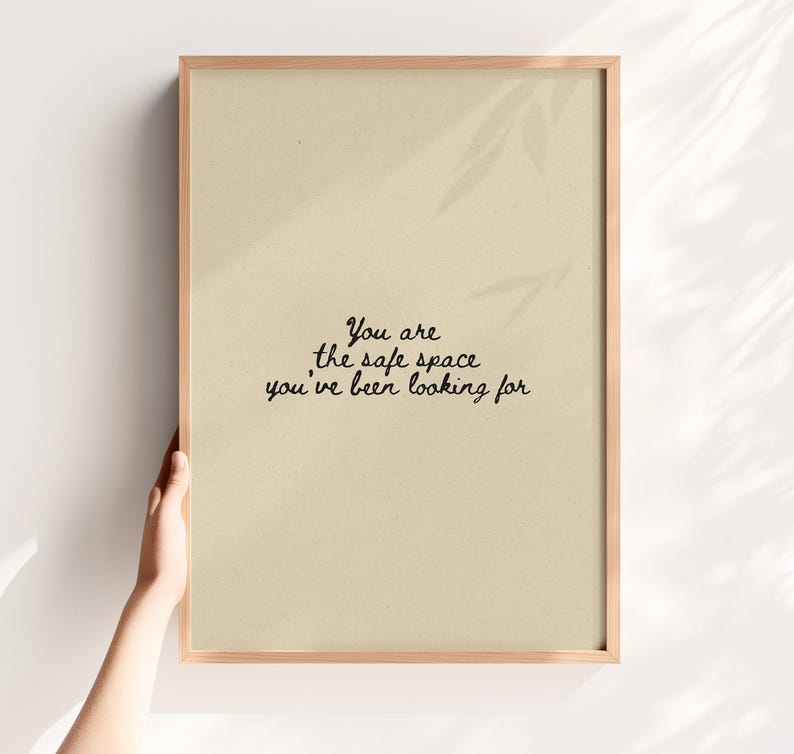 Minimalist typography on a beige background with the text: "This is a safe space, you are allowed to be yourself here."