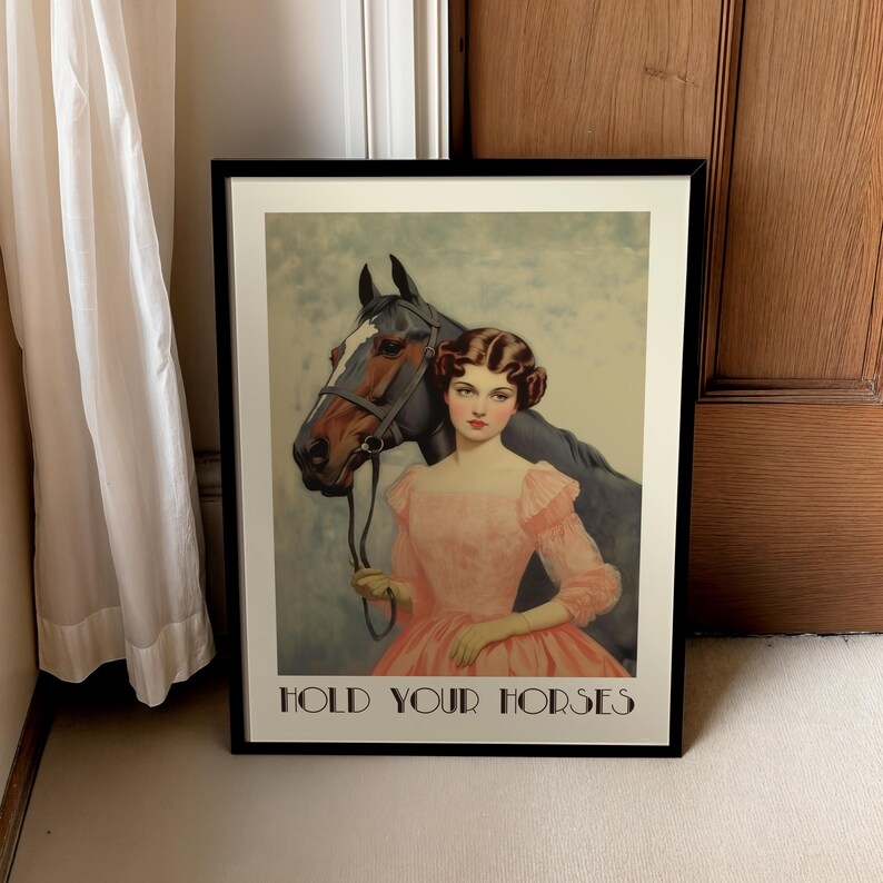 Vintage-style poster of a woman in a pink dress standing beside a horse, styled as equestrian wall art with country chic art and western decor charm, text reads “HOLD YOUR HORSES”