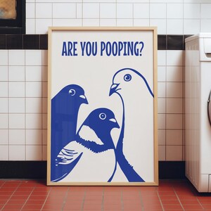 Three blue and white pigeons staring ahead under the question are you pooping. This funny bird art is a humorous bathroom sign or quirky restroom wall decor.