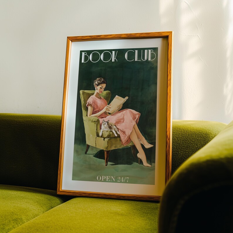 Vintage-style poster of a woman reading in an armchair with a cat, designed as book club art for a reading corner art space with a soft midcentury print feel, text reads “BOOK CLUB” and “OPEN 24/7”.