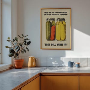 Retro-style digital art print of a green pickle jar with "Just Dill With It" text on a red background, styled as nostalgic kitchen wall decor.
