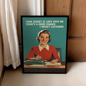 Retro 1950s style office humor wall art print of a smiling woman in a red shirt at a desk writing, with the bold teal text "YOUR SECRET IS SAFE WITH ME THERE'S A GOOD CHANCE I WASN'T LISTENING" written at the top.
