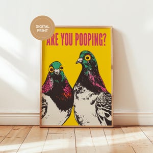 Bright pop art bright yellow poster of two pigeons staring forward,  funny toilet poster or guest bathroom art with text that reads “ARE YOU POOPING?”