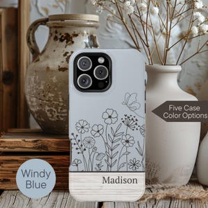 May include: A set of three ceramic mugs with a speckled, matte finish. The mugs are in shades of cream, light gray, and dark gray. Each mug has a simple, minimalist design, perfect for coffee or tea.