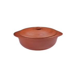 May include: A terracotta cooking pot with a lid. The pot has two handles and is a reddish-brown color.
