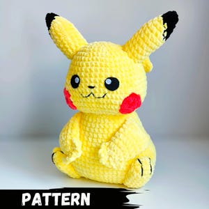 May include: A handmade yellow crochet Pikachu plush toy with black eyes, red cheeks, and black-tipped ears. The plush is sitting down and has the word "PATTERN" in a black banner at the bottom.