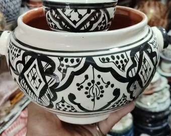 Hand-decorated raw clay bowl