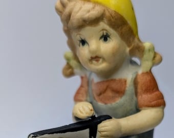 Vintage - figurine - Girl / girl with saw - porcelain - 4'' tall